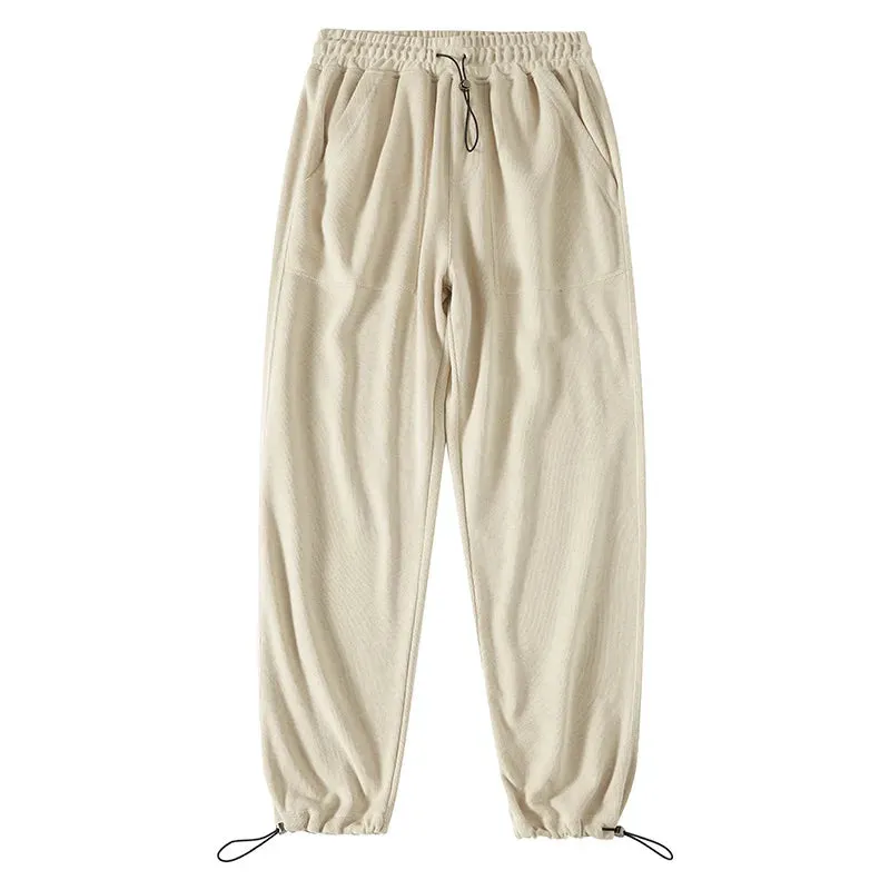 Adjustable Drawstring Men's Sweatpants: Casual Baggy Sports Trousers with Solid Color and Pockets