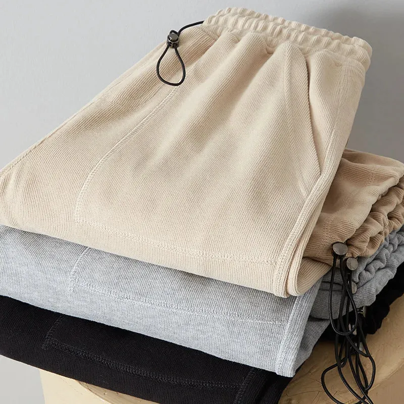 Adjustable Drawstring Men's Sweatpants: Casual Baggy Sports Trousers with Solid Color and Pockets
