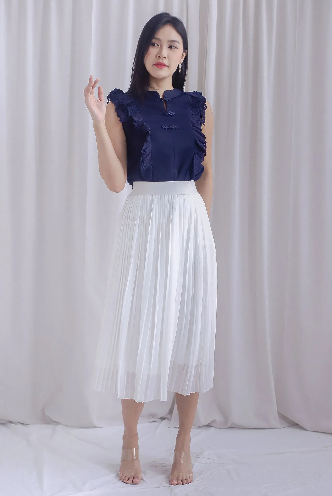 Ashlee Eyelet Flutter Oriental Collar Top In Navy Blue