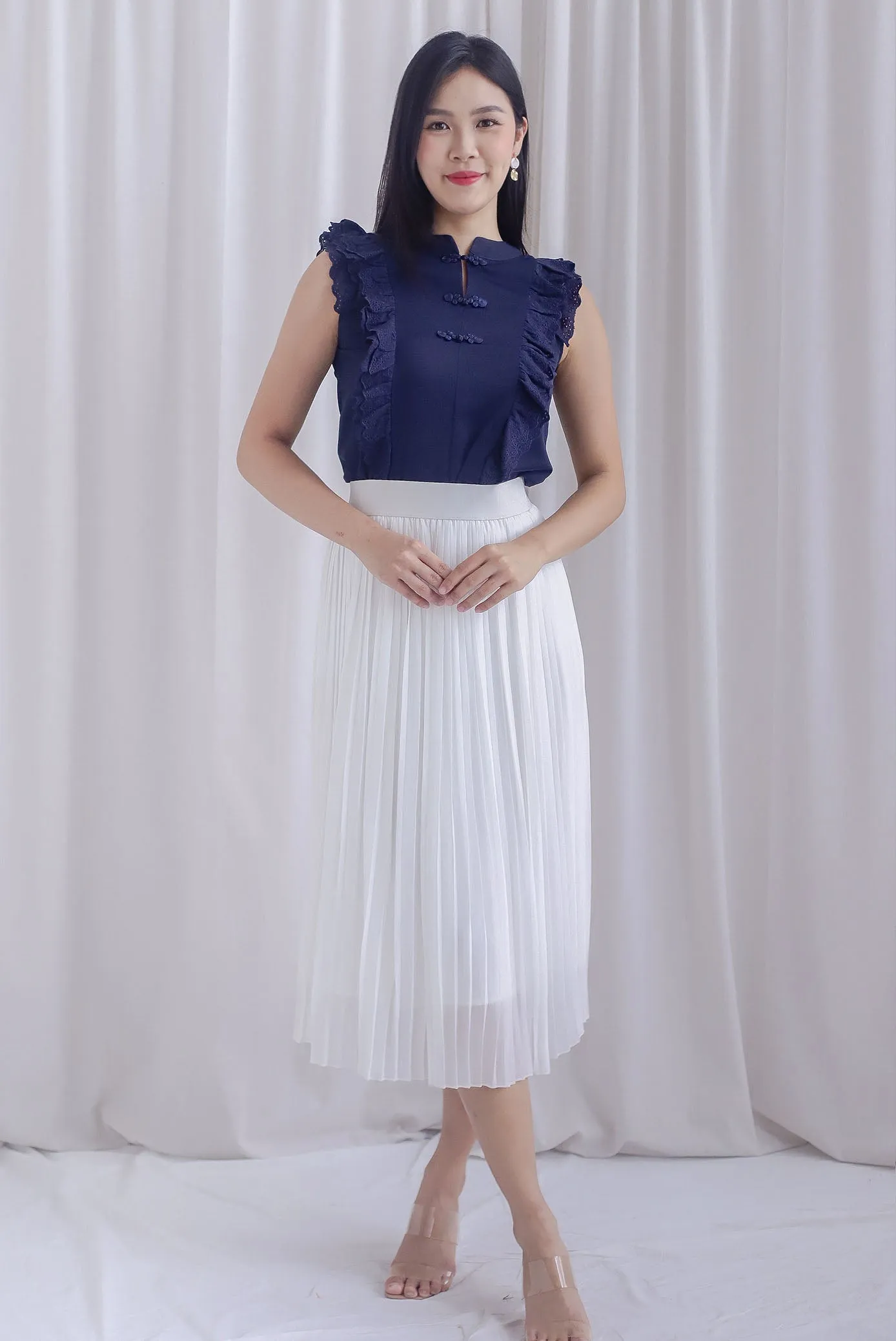 Ashlee Eyelet Flutter Oriental Collar Top In Navy Blue