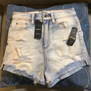 Bebe hi-waist distressed boyfriend jean shorts NWT