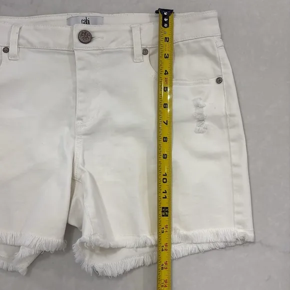 Cabi white Tomboy cutoff shorts