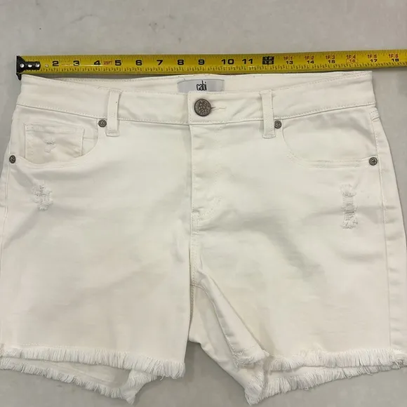 Cabi white Tomboy cutoff shorts